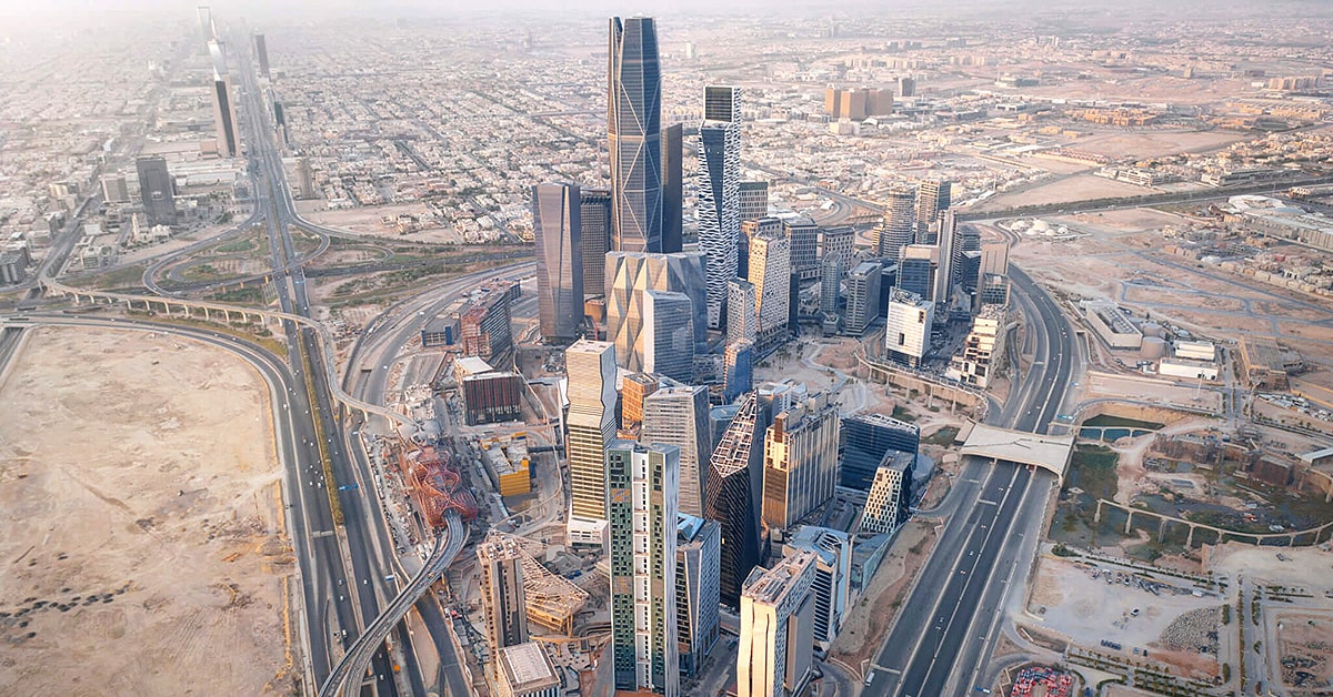 Aerial view of Riyadh skyline with modern towers and highway infrastructure